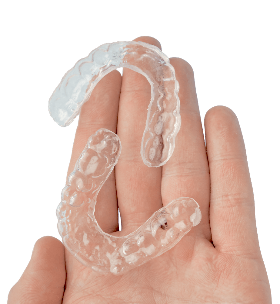 transparent teeth retainers hand